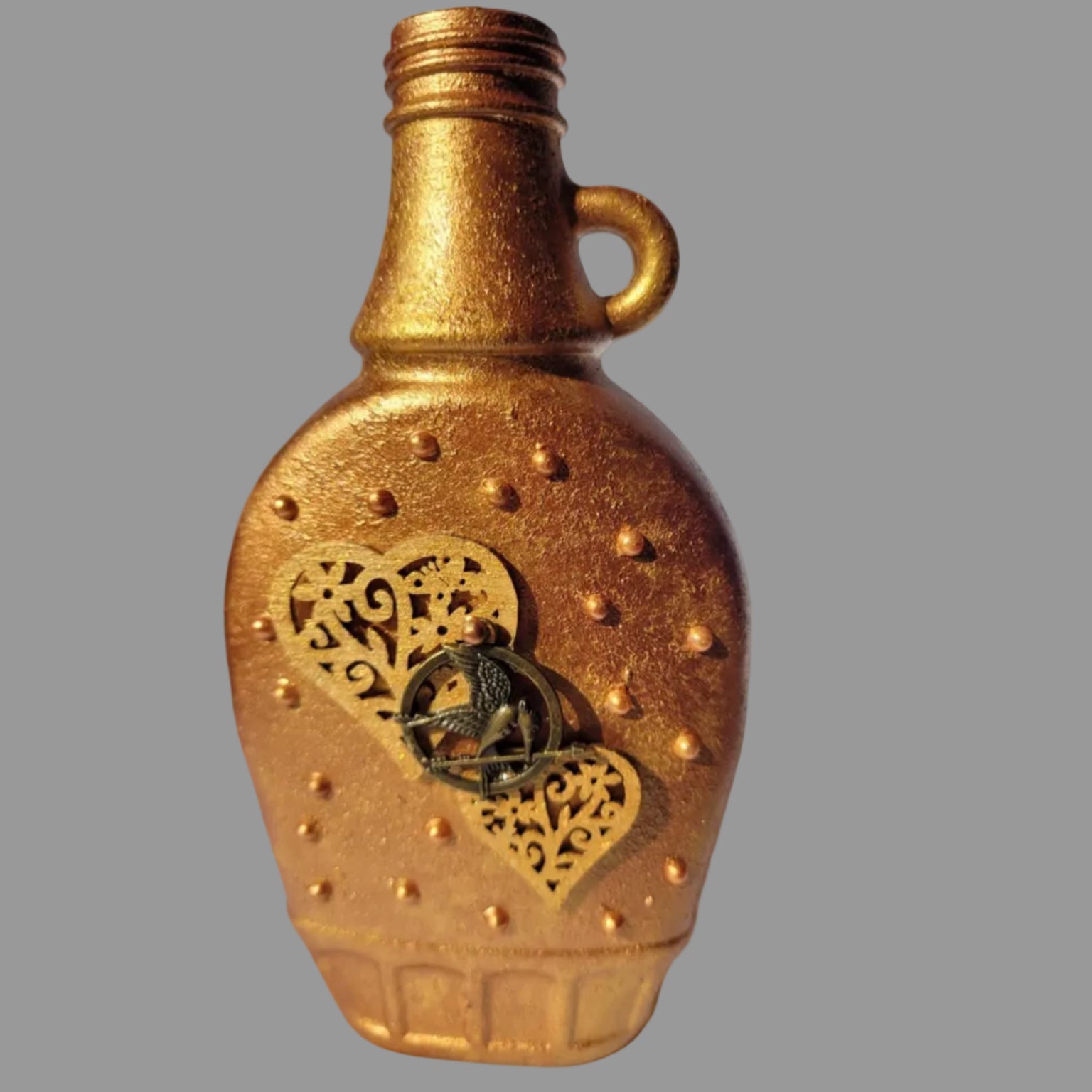 small upcycled bottle, bud vase, hand decorated bronze, mocking jay charm, hearts