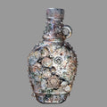 Small upcycled bottle, with handle decorated in steampunk