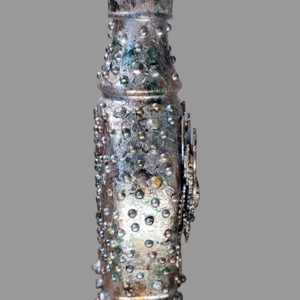 Small upcycled bottle, with handle decorated in steampunk