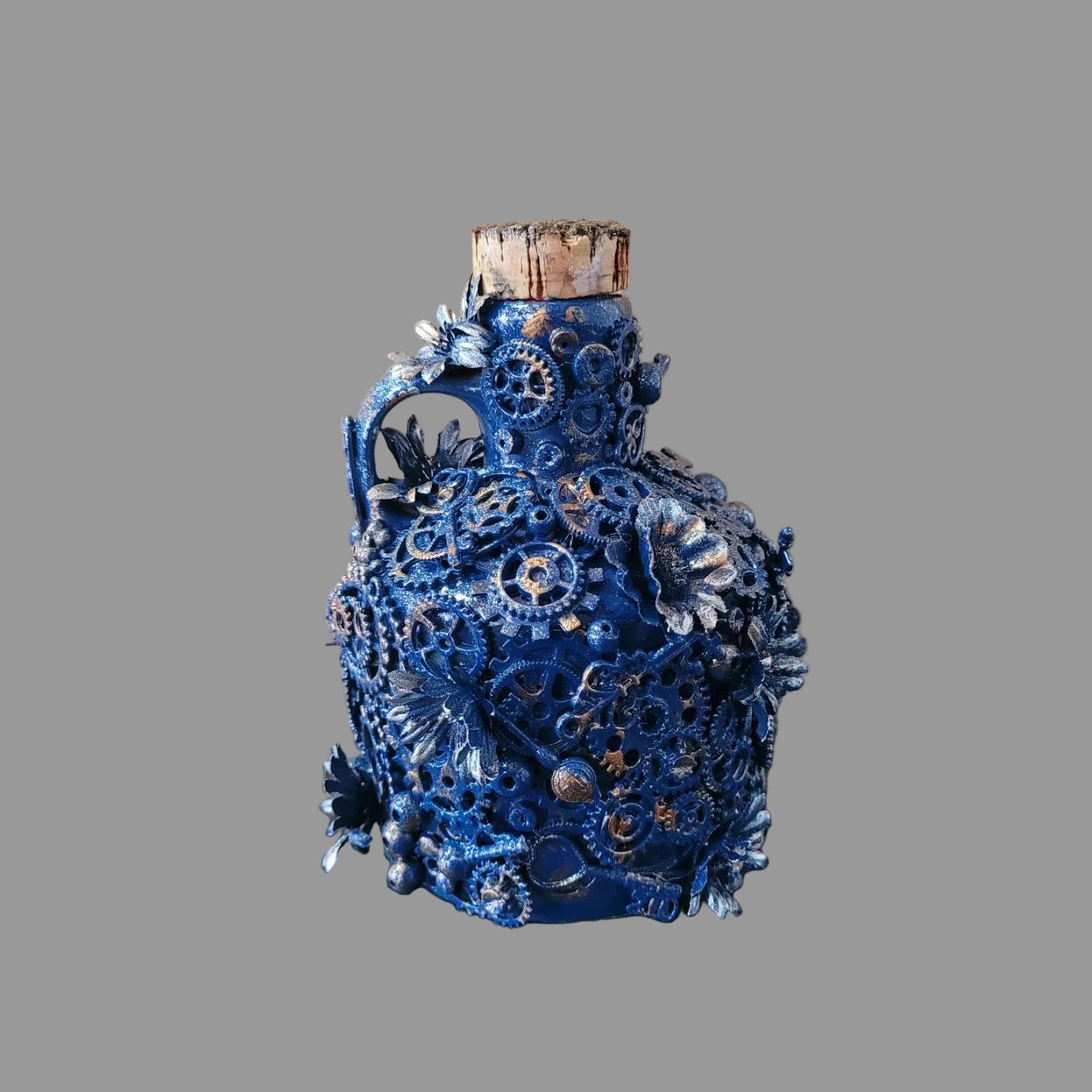 Steampunk and floral inspired upcycled squat ceramic bottle, blue and silver, cork stopper